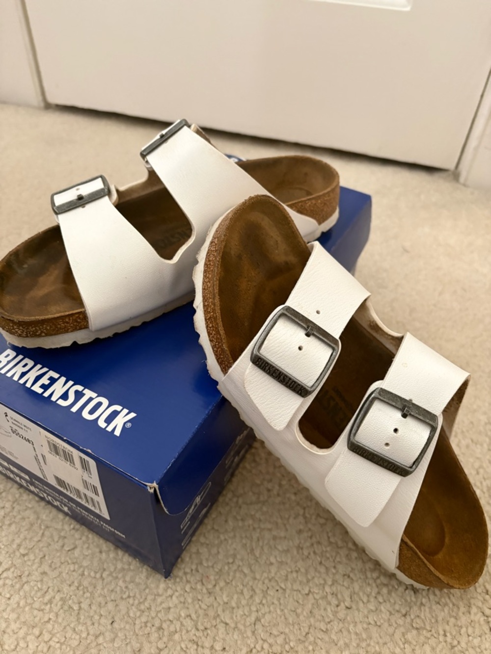 Birkenstock White Arizona Two-Strap Sandals with Silver Buckles